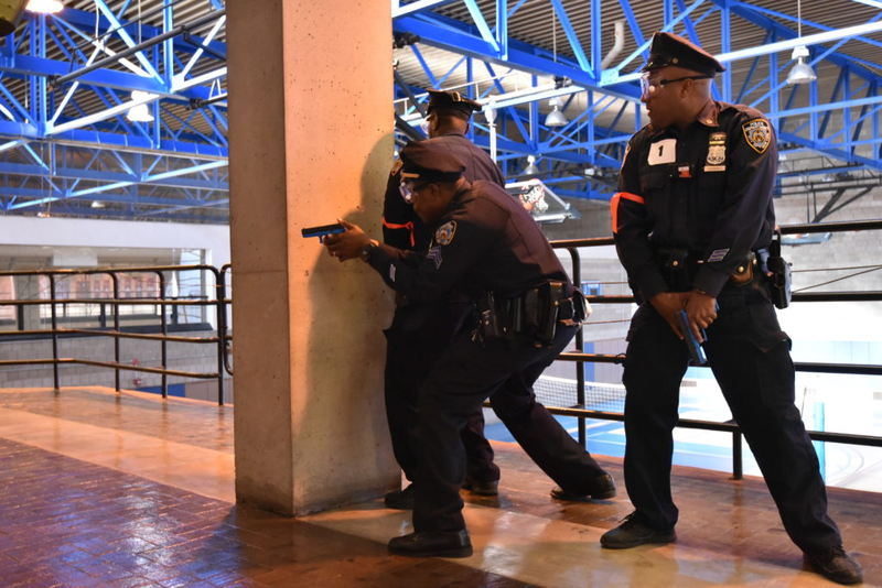 Police search through a Brooklyn high school during an active shooter drill on May 15, 2016 (NYPD)